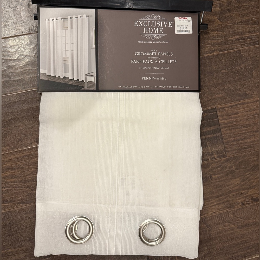 Brand new Exclusive Home Grommet Panels.  Set of 2.  White.  50”W by 96”L.
